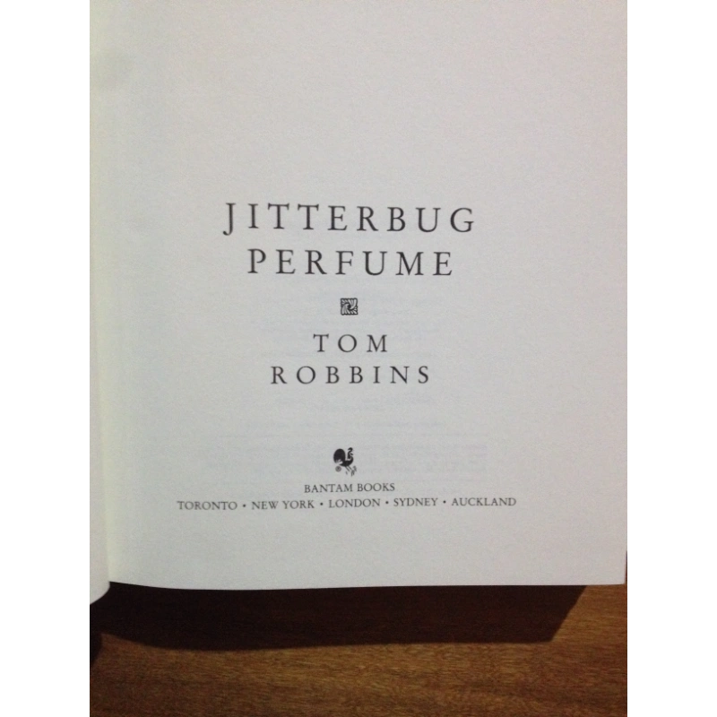 JITTERBUG PERFUME  BY: TOM ROBBINS BooksCardsNBikes